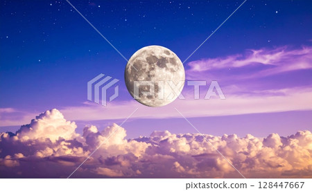 Moonlight illuminates a dark fantasy landscape under a sky full of stars 128447667