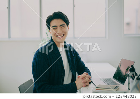 Men working in the office Men working in the office 128448022