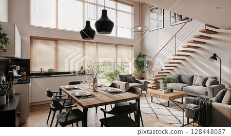 Modern open floor plan living room with dining area and natural light from large windows 128448087