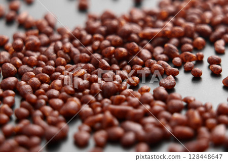 Coffee spice particles with cocoa and cardamom ingredient. Macro shot 128448647