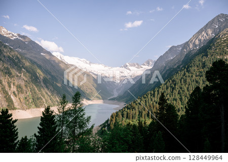 Scenic view of glacier and mountain lake in the Austrian Alps 128449964