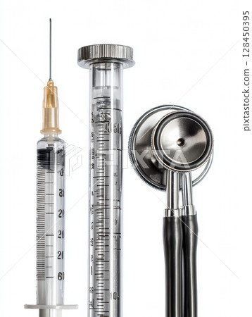 Collection of essential veterinary tools like a syringe, thermometer, and stethoscope arranged neatly on a white background for animal medical procedures. 128450395