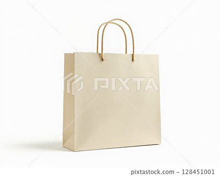 Simple kraft paper bag with twisted handles for shopping or gifting displayed against a minimalist background 128451001