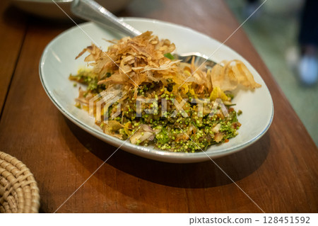 Traditional Thai Flower Salad with Banana Blossom and Herbs 128451592