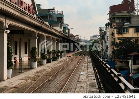 Urban Railway above Rooftops_Hanoi, Vietnam Urban Railway above Rooftops_Hanoi, Vietnam 128451641
