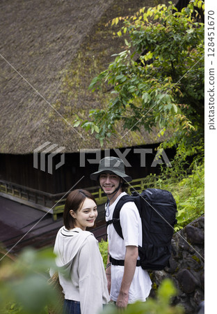 Travelers enjoying sightseeing in Japan Travelers enjoying sightseeing in Japan 128451670