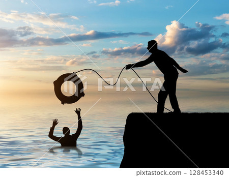 A silhouette of a man throws a lifeline to another man who is drowning in the water A silhouette of a man throws a lifeline to another man who is drowning in the water 128453340