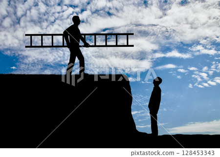 A silhouette of a man carries a ladder to another man who tries to get out on the upside 128453343