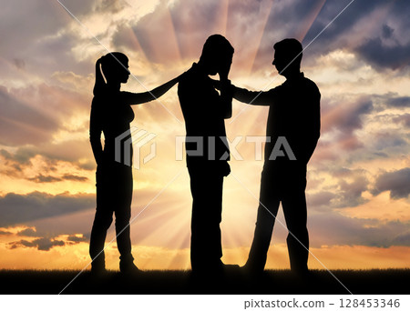 Silhouette of a woman and a man morally support another sad man Silhouette of a woman and a man morally support another sad man 128453346