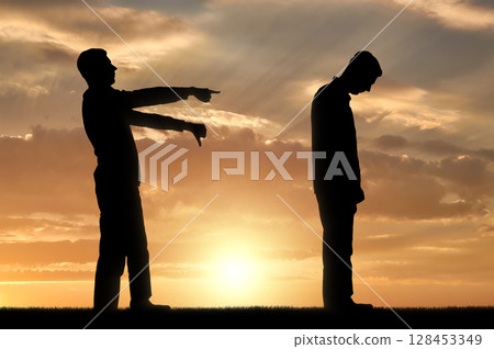 A silhouette of a man showing a finger at another man telling him that he is a loser 128453349
