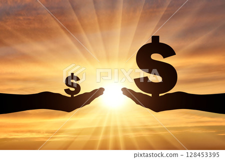 Silhouette of two hands, in one hand a large symbol of Dollar. In the second hand is a small symbol of the dollar 128453395