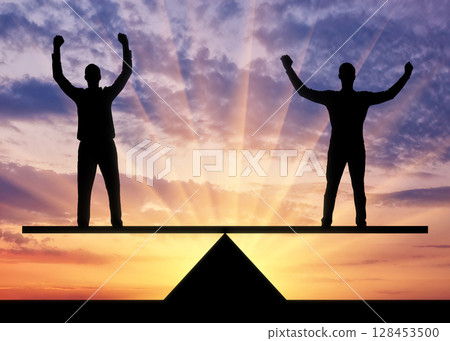 Silhouette two men are equal standing on the scales. 128453500