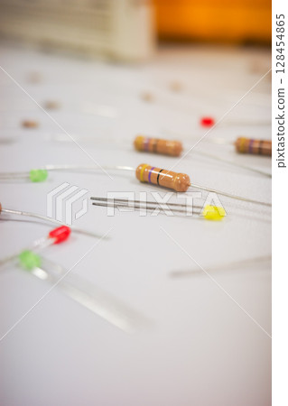 Close-up of electronic components on a white background 128454865