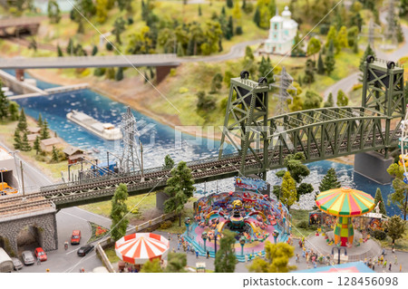 Toy Railway with Trains and Cars Toy Railway with Trains and Cars 128456098