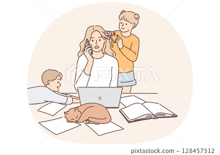 Mother works as freelancer at home and sits with children suffering from lack of workspace 128457312
