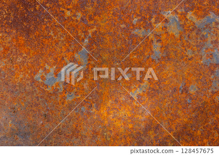 Rusty flat metal texture in industrial outdoor setting during daytime 128457675