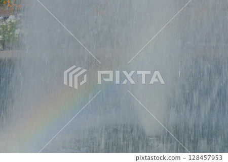 Fountain and rainbow in the park Fountain and rainbow in the park 128457953
