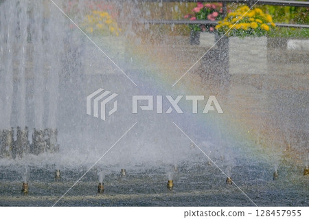 Fountain and rainbow in the park Fountain and rainbow in the park 128457955