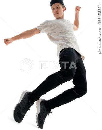 Hip-hop dancer performing on white background Hip-hop dancer performing on white background 128458864