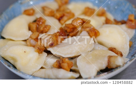 cook dumplings in a saucepan vareniki Step by step cooking process cook dumplings in a saucepan vareniki Step by step cooking process 128458882