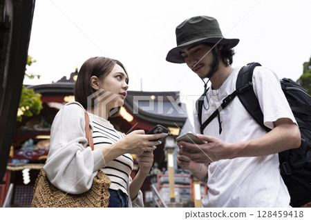 Inbound tourists enjoying sightseeing in Japan 128459418