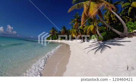 Crystal clear turquoise water gently laps the shore of a pristine white sand beach, fringed by lush palm trees under a vibrant blue sky, creating a perfect tropical paradise Crystal clear turquoise water gently laps the shore of a pristine white sand beach, fringed by lush palm trees under a vibrant blue sky, creating a perfect tropical paradise 128460421