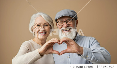 senior couple in love shaping with their hands 128460798