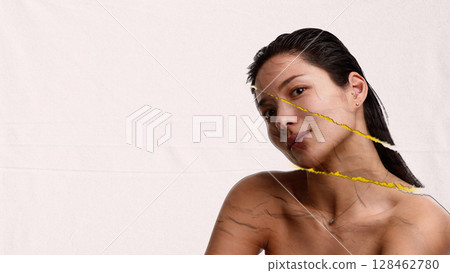 Surreal composition. Portrait of woman with torn transparent face and thoughtful expression 128462780