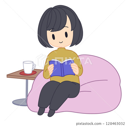 一個女人坐在墊子上看書 128463032