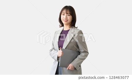 Woman with a laptop / business woman Woman with a laptop / business woman 128463077