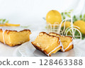 Cut cake showing the cross section of lemon cake with icing 128463388