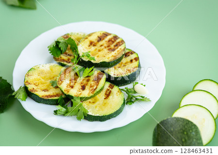 Fried zucchini slices in a healthy food style 128463431
