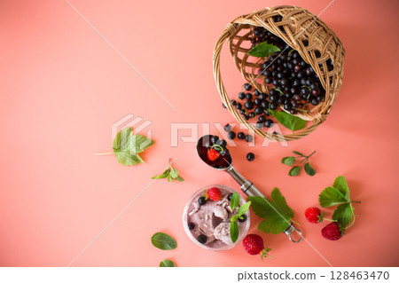 Homemade berry dessert from blackcurrant and strawberries 128463470