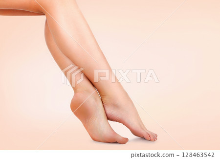 Beautiful female legs with smooth skin after depilation. Waxing concept 128463542