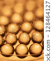 Close-up of shiny yellow vitamin capsules, healthy concept 128464127