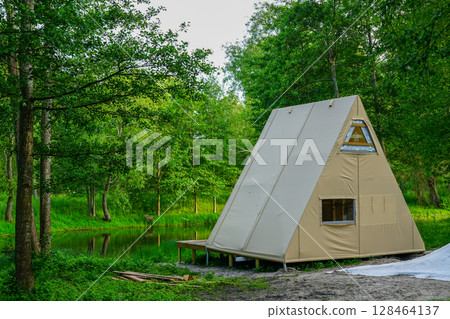 Newly Built A-Frame Glamping Cabin by Forest Pond with Minimalist Beige Covering 128464137