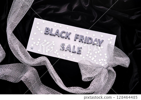 Abstract dark background with the inscription BLACK FRIDAY SALE. 128464485