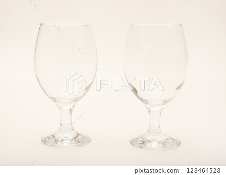 Empty glass glasses. Glassware. Empty glass glasses. Glassware. 128464528