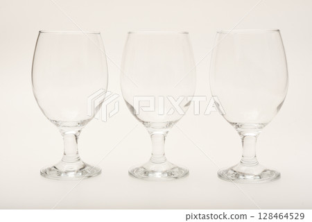 Empty glass glasses. Glassware. Empty glass glasses. Glassware. 128464529