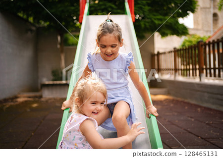 Joyful summer afternoons in Greece with playful children 128465131