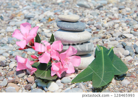 Zen stones on a beach Zen stones on a beach 128465993