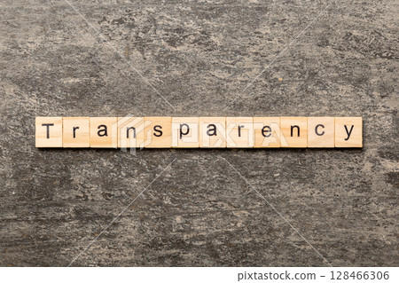 transparency word written on wood block. transparency text on table, concept transparency word written on wood block. transparency text on table, concept 128466306