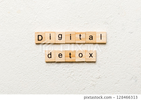 Digital Detox word written on wood block. Digital Detox text on table, concept 128466313