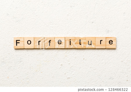 forfeiture word written on wood block. forfeiture text on table, concept forfeiture word written on wood block. forfeiture text on table, concept 128466322