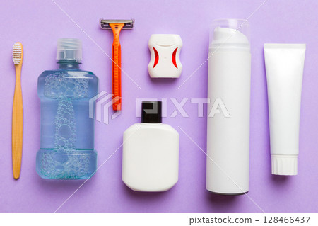 Mockup for bathing products top view flat lay, spa razor, toothpaste, soap, gel and other various accessories. Cosmetics for skin health. Bath Mockup for your logo 128466437