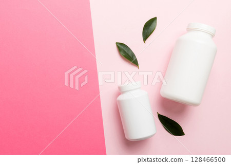 supplement pills with medicine bottle health care and medical top view. Vitamin tablets. Top view mockup bottle for pills and vitamins with green leaves, natural organic bio supplement, copy space supplement pills with medicine bottle health care and medical top view. Vitamin tablets. Top view mockup bottle for pills and vitamins with green leaves, natural organic bio supplement, copy space 128466500