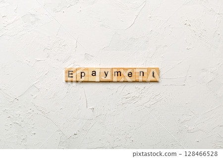 E-payment word written on wood block. E-payment text on cement table for your desing, concept 128466528
