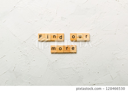 Find out more word written on wood block. Find out more text on cement table for your desing, Top view concept 128466530