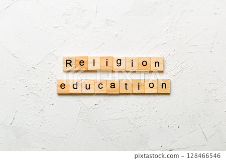 religion education word written on wood block. religion education text on cement table for your desing, concept 128466546
