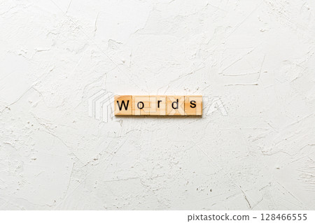 word written on wood block. WORD text on cement table for your desing, concept word written on wood block. WORD text on cement table for your desing, concept 128466555